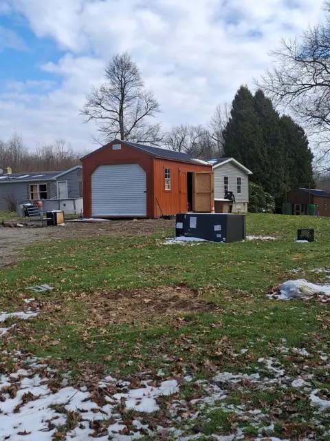 Past shed delivery and placement — photo 58